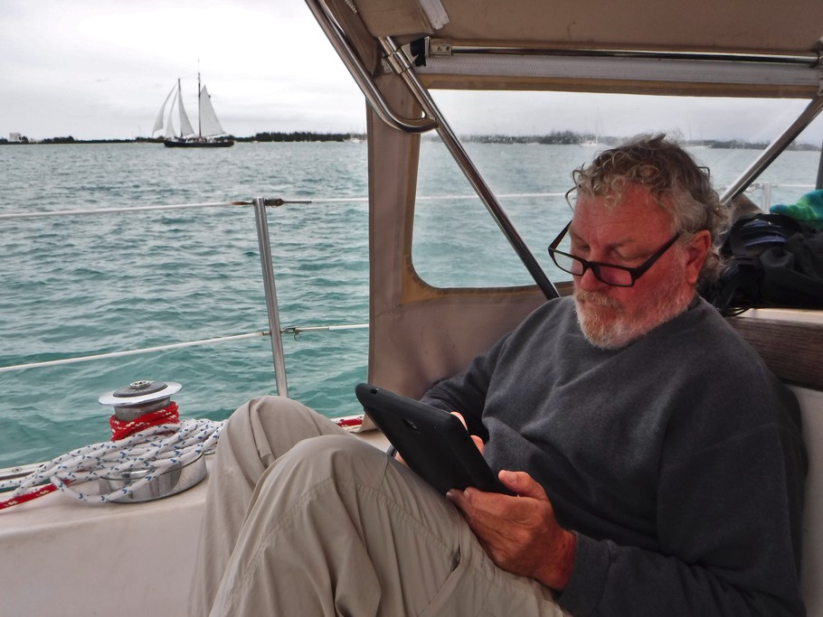 Lots of crossword puzzles got completed during our stay in Key West. In the background you see one of the big touring schooners. Even though they still sailed most days, we know their tickets sales must have been suffering due to the weather.