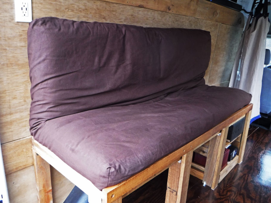 And here's the finished sofa/bed, sporting the new cover Duwan sewed for the mattress. 