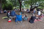 Friends gather under the big tree in Cabbagetown Park to hear Greg and friends perform.