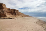Sandy cliff along the beach.